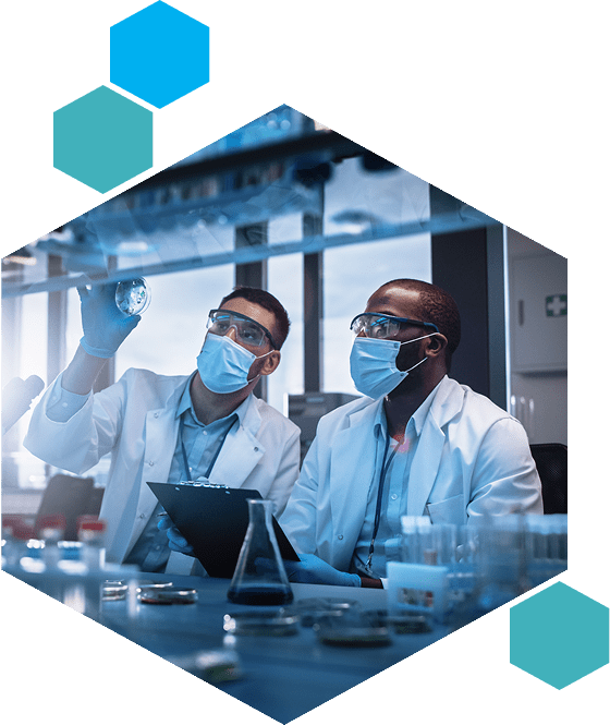 Scientists analyzing samples in a laboratory setting.