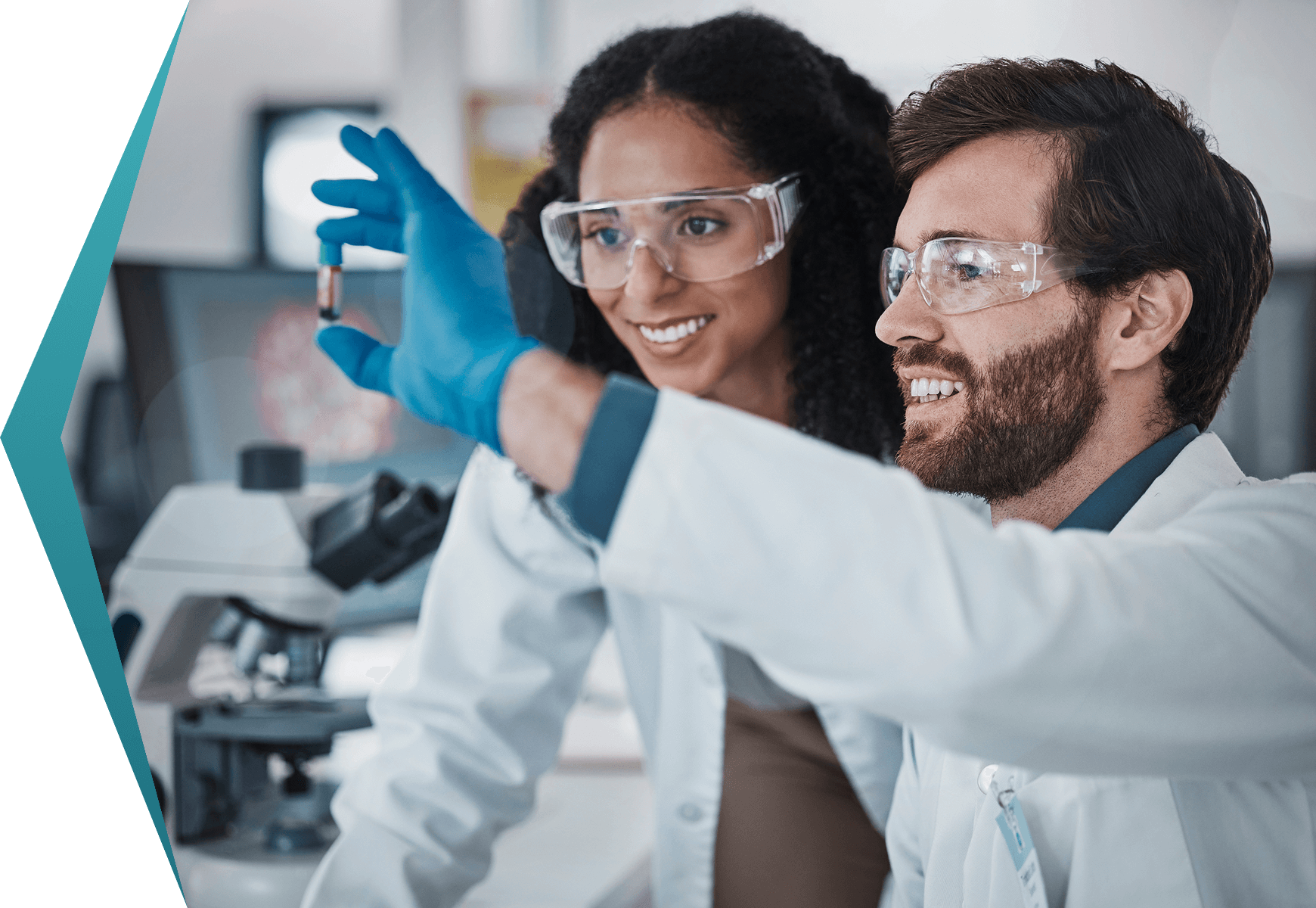 Scientists examining a sample in laboratory.